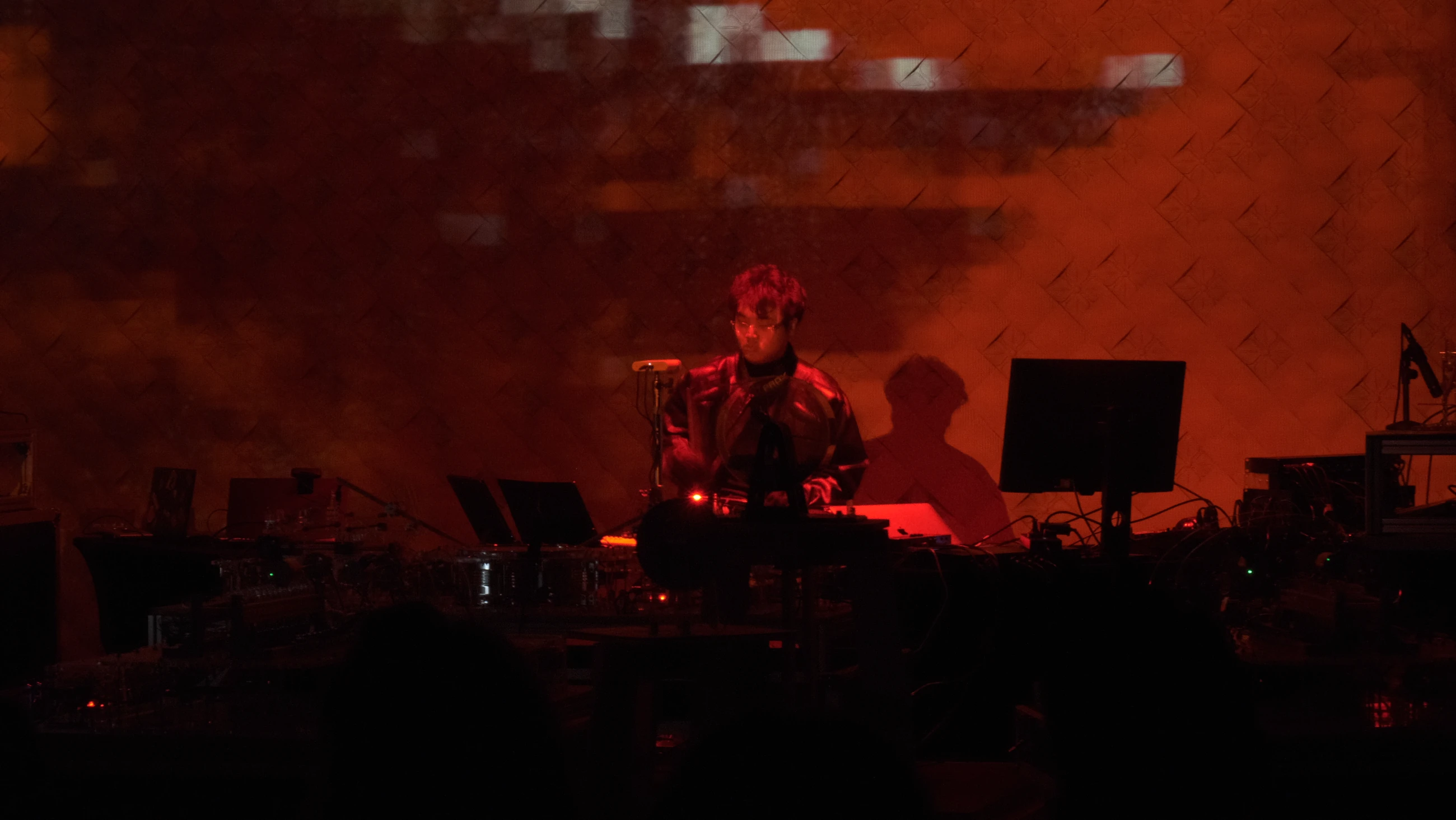 Techno Crash — red-lit performance documentation